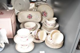 A vinateg J & G Meakin tea service, decorated with gilt edging and floral patterns, approx. 34