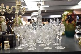 A group of crystal cut glass ware comprising of six wine glasses, siz port glasses and a decanter