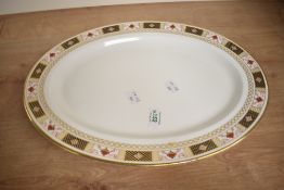 A Royal Crown Derby bone china ashette, decorated with Imari style border on a white ground,