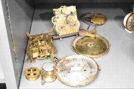 An early 20th century brass clock dial, w15.5cm, sold together with another clock face, 2