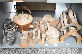 A group of 19th century equestrian stable fittings, sold together with a top hot holder and saddle