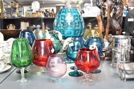 A large group of oversized brandy glasses in various colours, to include cats and mice, largest