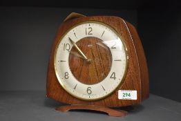 An early 20th century 'Smiths' 8 - day mantel clock, having floating balance wheel and single gong