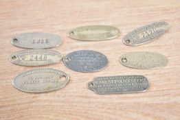 A group of 8 vintage key tokens impressed with various agencies names and public bodies, to