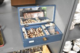 A blue faux leather jewellery box, containing a collection of costume jewellery including beaded