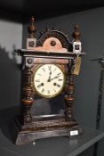 A late 19th century mantel clock having Roman chapter ring and single gong strike, h82cm Condition