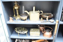 After Dr Christopher Dresser - An early 20th century brass watering can, having shaped spout and