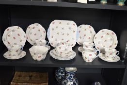 A Shelley 'Forget-Me-Not' pattern fine bone china tea service decorated with pink roses, yellow,