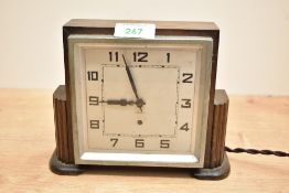 An early 20th century oak cased electric mantel clock in the Art Deco style, L15.5cm Condition