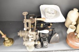 A vintage black metal weighing scale with weights, L34cm, sold together with an iron and meat