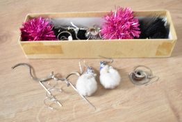 A box containing various woman's jewellery, to include Santa earrings, broaches and necklaces.