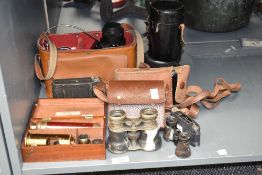 A F. J. Cox of London brass telescope set, L17.5cm, sold together with binoculars and camera