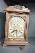 An late 19th oak cased bracket clock, having Westminister chimes, the movement marked 'Gustav