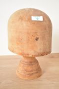 An early 20th century solid beech hat block, h28cm