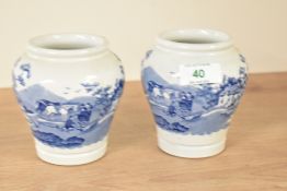 A pair of Fortnum & Mason's ceramic pots of baluster form, decorated with blue and white transfer