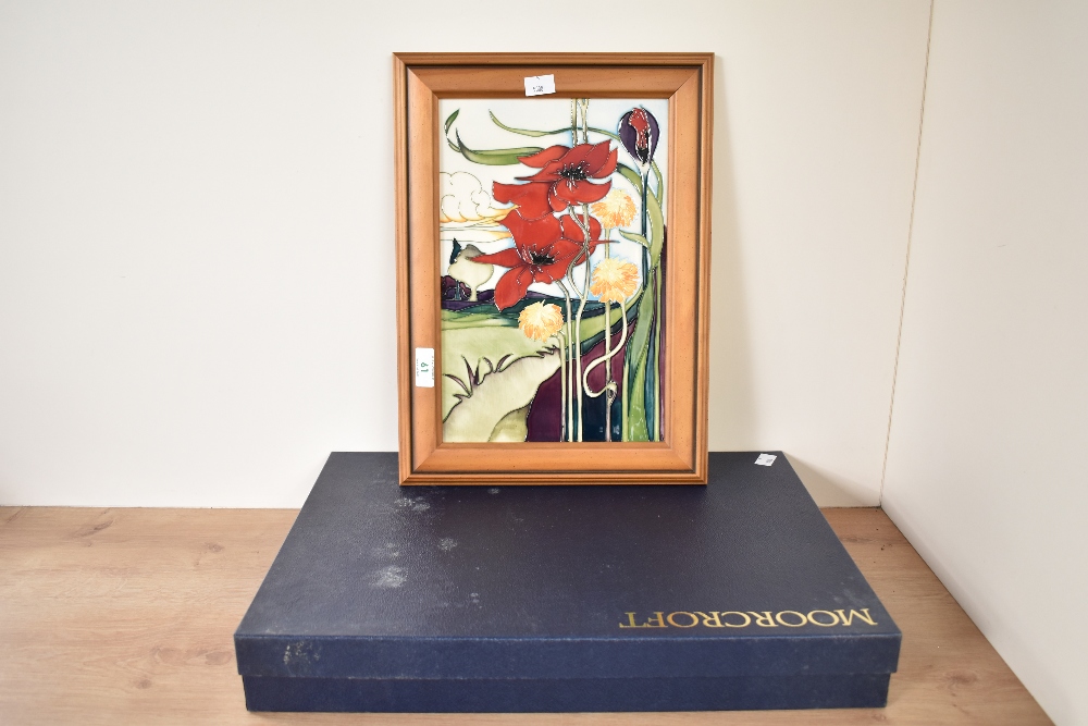 A pottery Moorcroft ceramic tile, decorated with poppies and tulips, painted and impressed marks