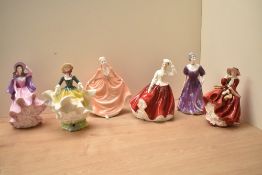 A group of three Royal Doulton bone china figurines comprising 'Top O The Hill' HN 1834, 'Gail' HN