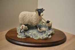 A Border Fine Arts figure group 'Young Farmers' model number A1453, by Ray Ayres with signature to