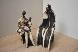 After Stefan Gorski (1932-2008) a pair of studio pottery figures, one depicting a couple the other