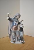 A large Lladro porcelain figure group 'Circus Magic' model number 5892, measures 28cm.