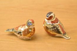 Two Royal Crown Derby bone china paperweights, Linnet and Chaffinch both having Imari style