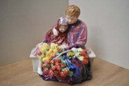 A Royal Doulton bone china figure group 'Flower Sellers Children' HN 1342.