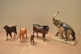 Three Beswick Pottery horses and one similar comprising Mare (Facing Right, Head Down) model