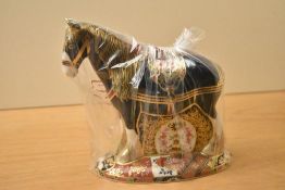 A Royal Crown Derby bone china limited edition Shire Horse number 1130/1500, having Imari style