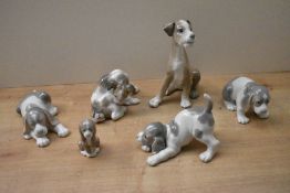 A group of six Lladro porcelain dog studies including 'Setter' model number 4583, 'Dog and