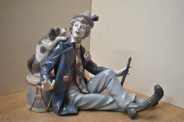 A large Lladro porcelain figure 'Musical Partners' model number 5763, measures 22cm tall.