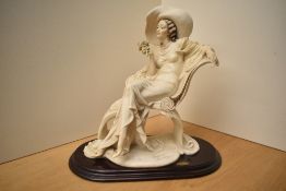 Capodimonte Giuseppe Armani Florence figurine 'At Ease', signature to the front, measuring 39cm