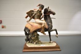 A large Capodimonte porcelain figure depicting French Hussar on horseback having damage to hat and