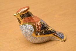 A Royal Crown Derby bone china paperweight Waxwing, having Imari style decoration and silver