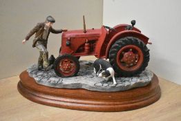 A Border Fine Arts exclusive figure group 'Kick Start' model number B0541, back of tractor is loose.