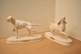 A pair of Beswick Pottery dog studies, Spaniel and The Pointer, both on large bases.