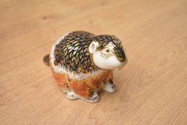 A Royal Crown Derby limited edition bone china Riverbank Beaver paperweight, having Imari style
