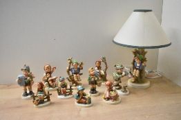 A group of eleven vintage Goebel porcelain figures/figurines including 'Good Hunting' model number