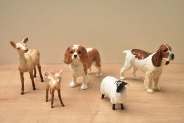 A group of five Beswick Pottery animal studies comprising King Charles Spaniel 'Blenheim' model