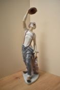 A large Lladro porcelain figure 'Hats off to Fun' model number 5765, measuring 42cm tall.