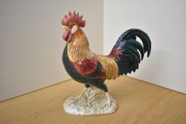 A Beswick Pottery Leghorn Cockerel model number 1892 designed by Arthur Gredington in teal,green,
