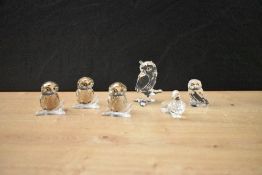 A group of five Swarovski Crystal Owls sold alongside a Swarovski Crystal Dove, all complete with