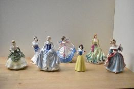 A group of seven Royal Doulton bone china figurines comprising 'For You' HN 3754 with broken arm,
