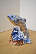 A Royal Crown Derby bone china Sinclair exclusive Leaping salmon paperweight, having Imari style