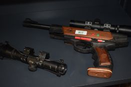 A Webley & Scott Webley Typhoon .22 Air Pistol with AGS sight fitted along with a spare AGS Scope