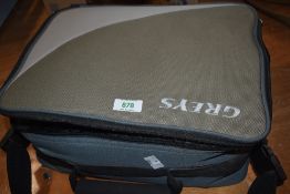 A greys 8 compartment soft reel case containing Two unmarked alloy salmon fly reels measuring 4.25