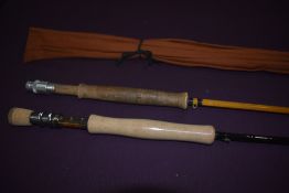 An unbranded 4pc 9ft 6in #7/8 poachers style lightweight fly rod in a black sleeve and an unmarked