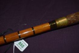 A 15ft 3pc split cane salmon fly rod by J S Walker of Alnwick with a spare tip in good used