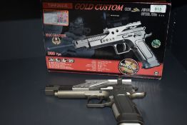 A Tanfoglio Gold Custom CO2 .177 BB Air Pistol for spares or repair with silver pistol grip,