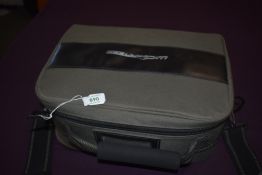 A Daiwa wilderness reel case containing 4 vintage fly reels and some unused fishing line and casts