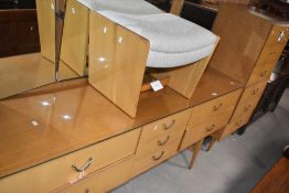A vintage Meredew dressing table and chest of six similar drawers, and dressing table stool